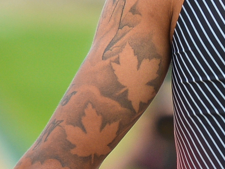 Ученые доказали повышения риска меланомы у людей с татуировками